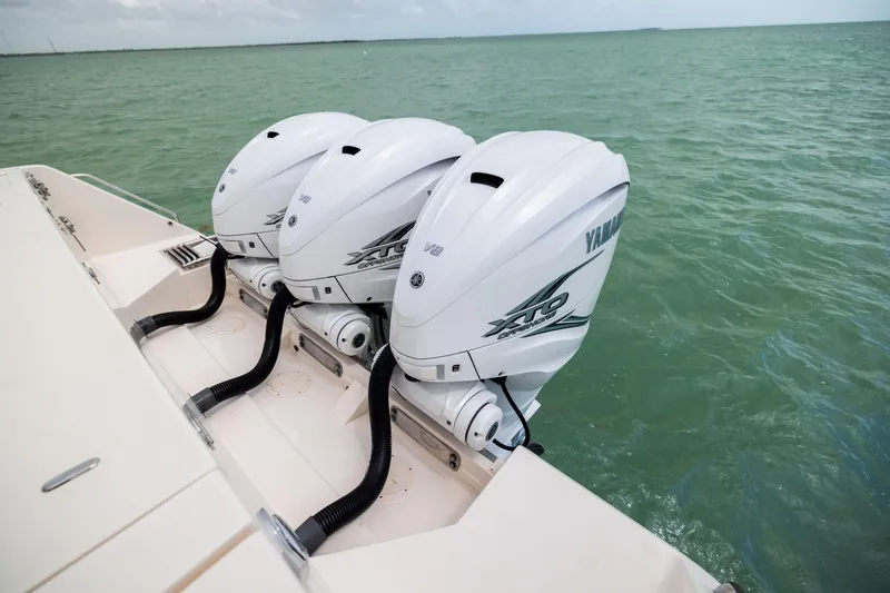 Slide: The Image of 2021 Grady-White Canyon 376 boat with triple Yamaha XTO V8 outboard engines. - 29