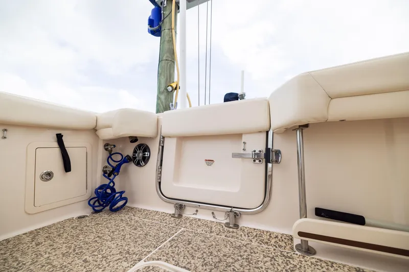 Slide: The Image of Interior view of a 2021 Grady-White Canyon 376 boat, featuring seating and storage. - 30