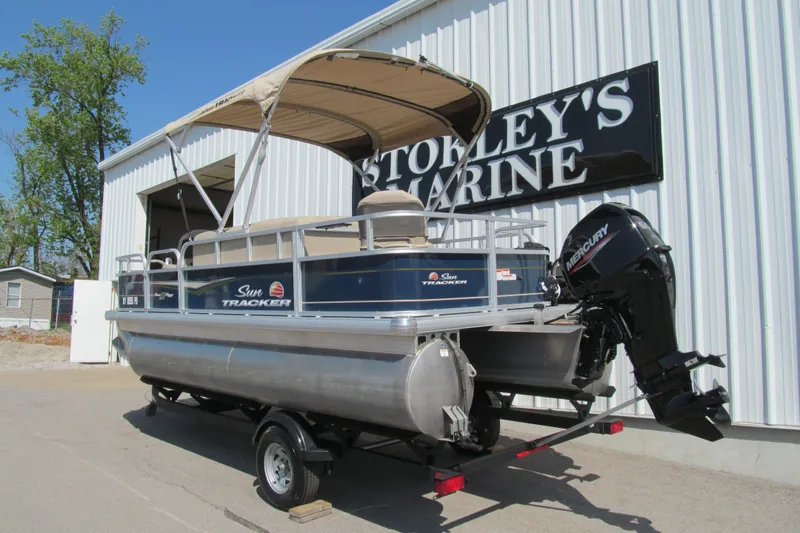 Slide: The Image of 2023 Sun Tracker Bass Buggy 18 DLX pontoon boat on trailer at Stokley's Marine. - 3