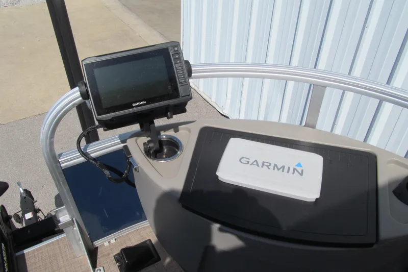 Slide: The Image of 2023 Sun Tracker Bass Buggy 18 DLX dashboard with Garmin navigation system. - 8