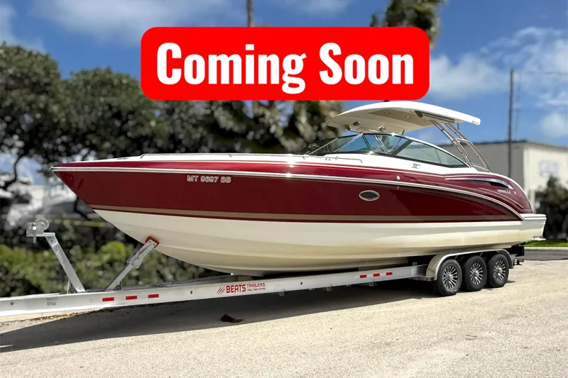 The Image of 2019 Formula 350 Crossover Bowrider I/O on trailer, "Coming Soon" sign displayed. - 0