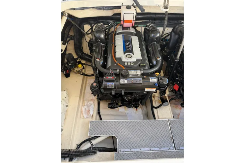 Slide: The Image of Engine compartment of a 2016 Formula 350 Crossover Bowrider I/O boat. - 17