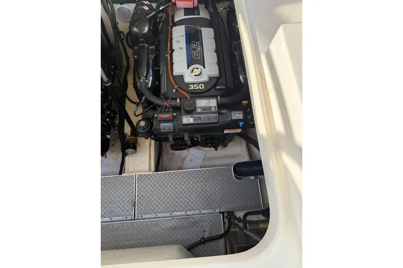 Slide: The Image of Engine compartment of a 2016 Formula 350 Crossover Bowrider I/O boat. - 18