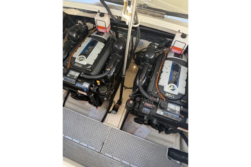 Slide: The Image of Twin engines of a 2016 Formula 350 Crossover Bowrider I/O boat. - 19