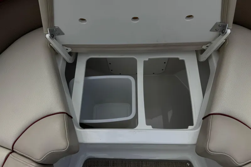 Slide: The Image of 2016 Formula 350 Crossover Bowrider I/O storage compartment with open lid. - 20