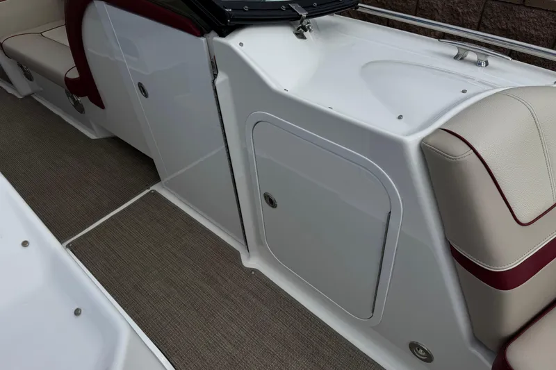Slide: The Image of 2016 Formula 350 Crossover Bowrider I/O interior with beige and red seating. - 22