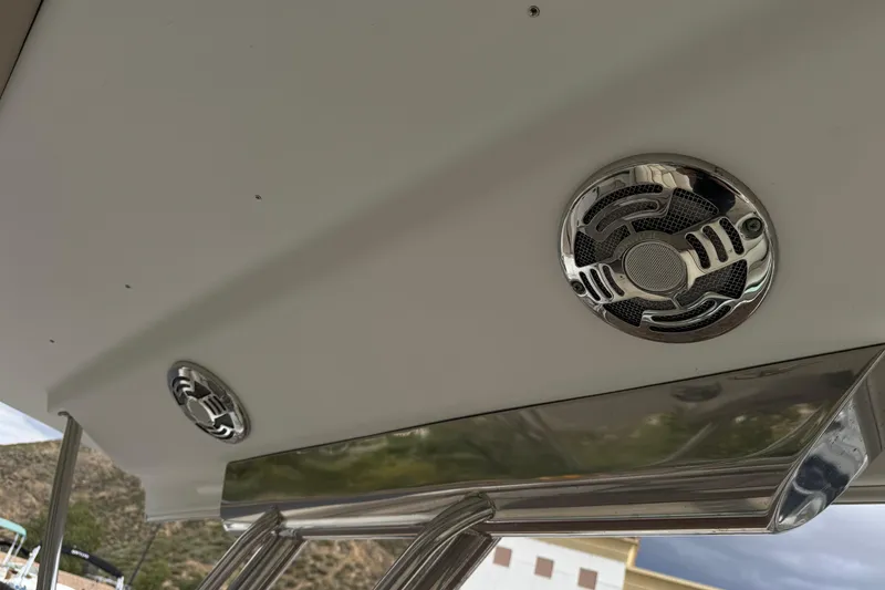 Slide: The Image of 2016 Formula 350 Crossover Bowrider I/O boat speakers and canopy detail. - 26