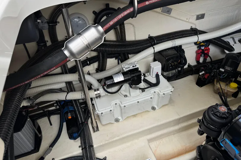 Slide: The Image of Engine compartment of a 2016 Formula 350 Crossover Bowrider I/O, showcasing mechanical components. - 36
