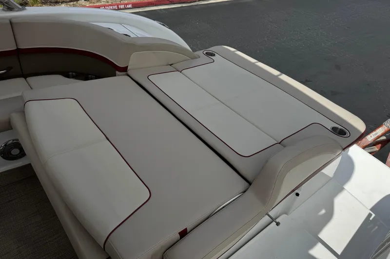 Slide: The Image of 2016 Formula 350 Crossover Bowrider I/O with beige seating and red accents. - 38