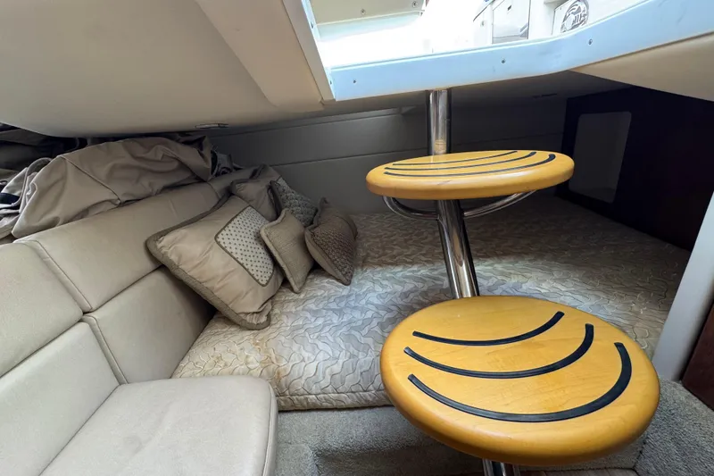 Slide: The Image of Interior cabin of 2016 Formula 350 Crossover Bowrider I/O with cozy bedding and pillows. - 60