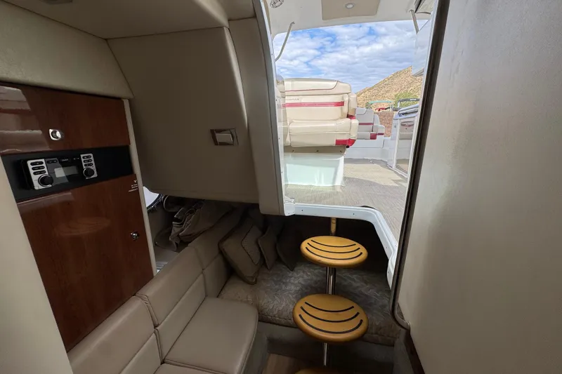 Slide: The Image of Interior view of 2016 Formula 350 Crossover Bowrider I/O with seating and control panel. - 63