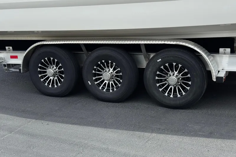 Slide: The Image of Triple-axle trailer with sleek wheels for 2016 Formula 350 Crossover Bowrider I/O boat. - 66