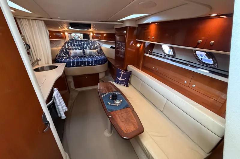 Slide: The Image of Luxurious interior of 2008 Sea Ray Sundancer 330 yacht with cozy seating and elegant wood finishes. - 30