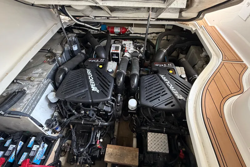 Slide: The Image of Engine compartment of a 2008 Sea Ray Sundancer 330 with twin Mercury engines. - 37