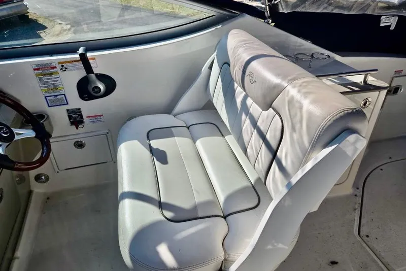 Slide: The Image of 2011 Sea Ray Sundancer 260 boat with registration number and Maryland decals. - 2
