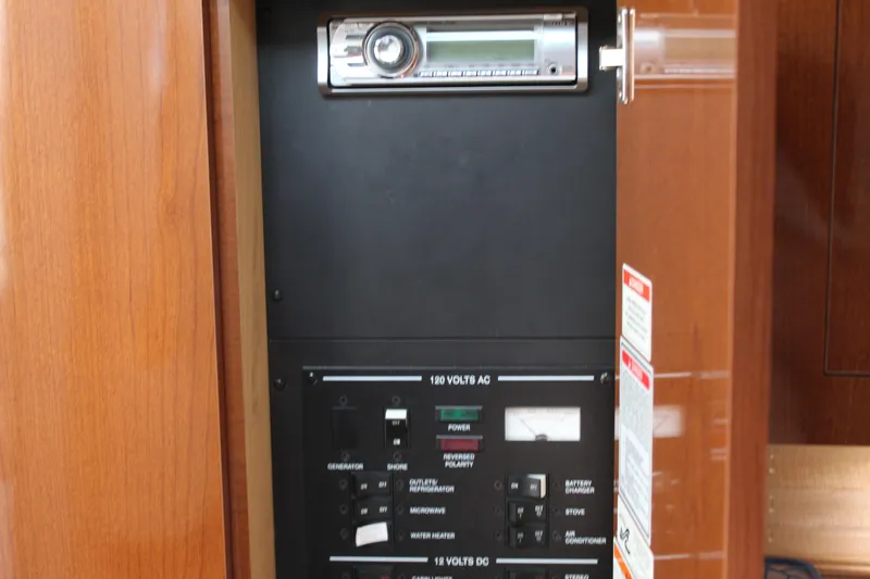 Slide: The Image of Control panel of a 2011 Sea Ray Sundancer 260 boat with stereo system. - 26