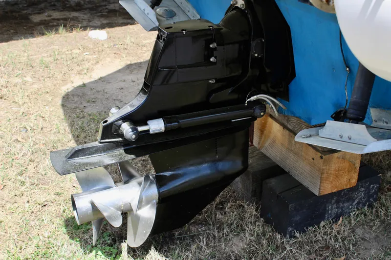 Slide: The Image of 2011 Sea Ray Sundancer 260 boat propeller and drive system on dry land. - 9
