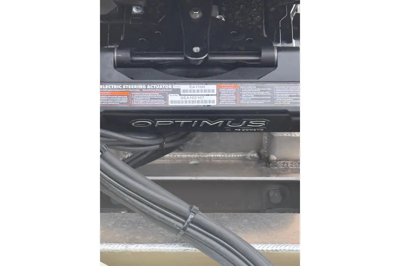 Slide: The Image of Close-up of Optimus electric steering actuator on 2026 Qwest L-Class Splash Pad 24. - 20