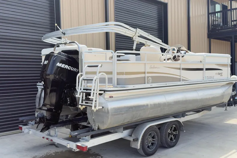 Slide: The Image of 2007 Harris Sunliner 220 pontoon boat with Mercury 90 engine on trailer. - 3