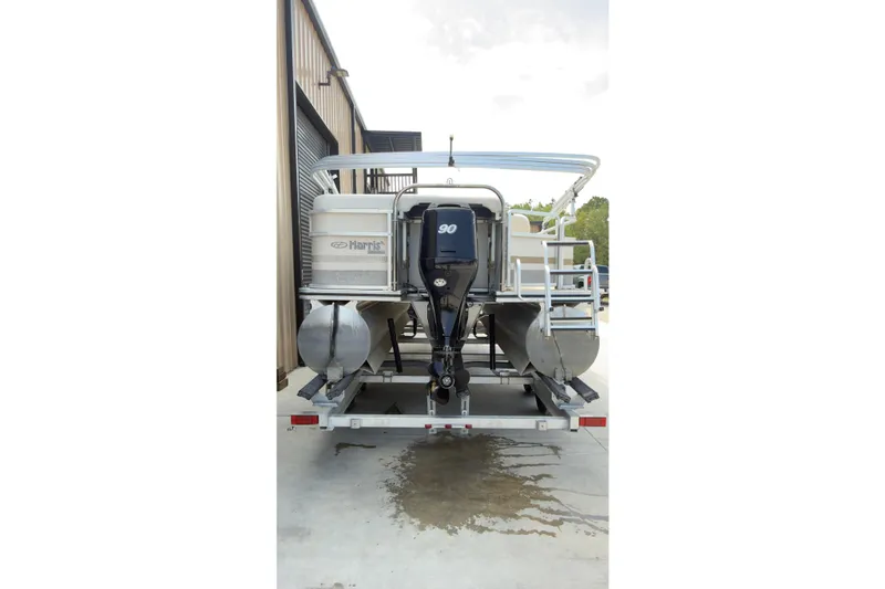 Slide: The Image of 2007 Harris Sunliner 220 pontoon boat on trailer, rear view. - 4