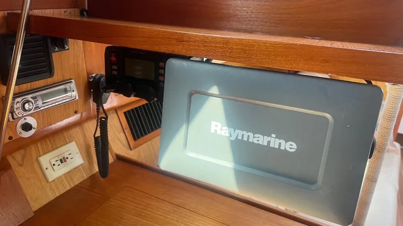 Slide: The Image of Interior of a 2000 Hunter 410 sailboat with Raymarine navigation equipment. - 28