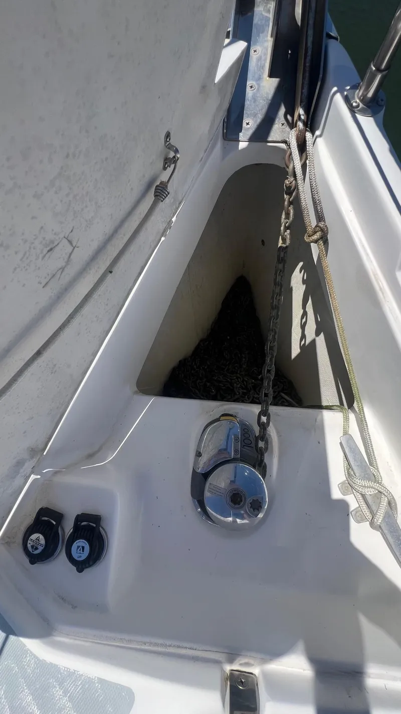 Slide: The Image of Anchor locker on 2000 Hunter 410 sailboat with chain and winch. - 38