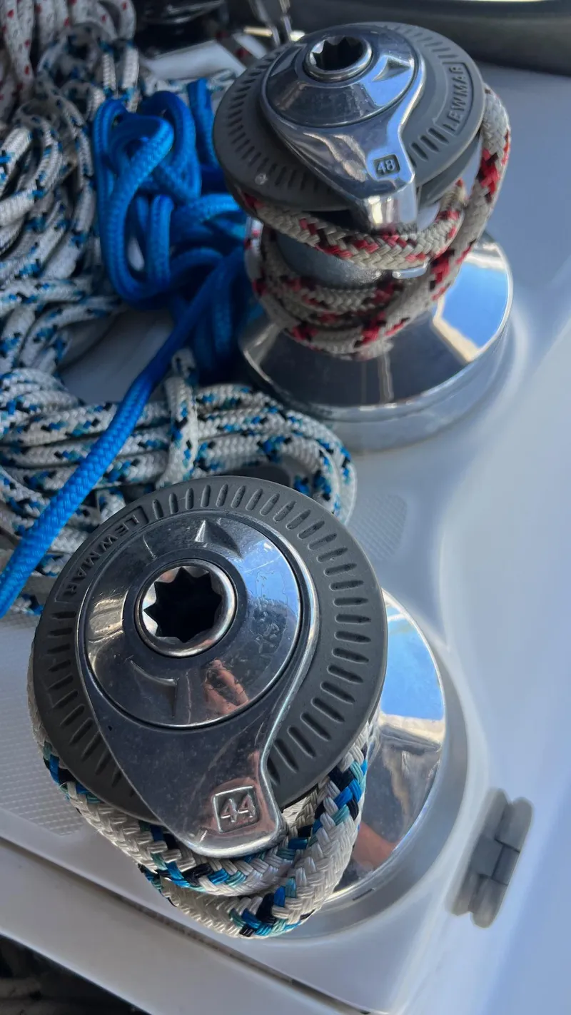 Slide: The Image of Sailing winches with ropes on a 2000 Hunter 410 yacht deck. - 45