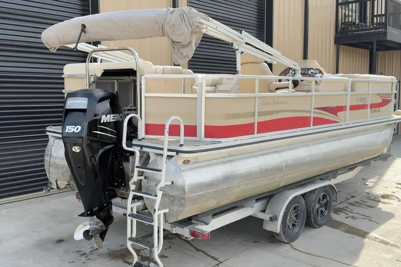 Slide: The Image of 2008 Harris Super Sunliner 220 pontoon boat with Mercury 150 engine on trailer. - 10