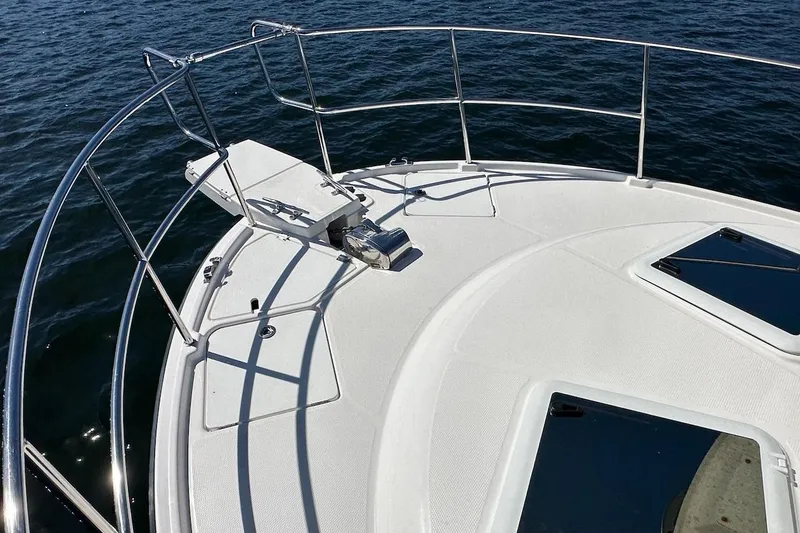 Slide: The Image of Bow of 2018 Ranger Tugs R-29 CB boat with stainless steel railings. - 25