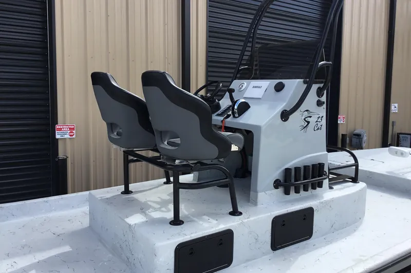 Slide: The Image of 2015 Shoalwater 23' Catamaran with dual seats and control console. - 3