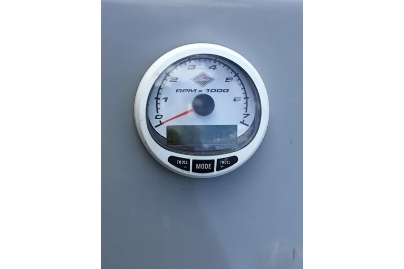 Slide: The Image of Tachometer on 2015 Shoalwater 23' Catamaran, displaying RPM x 1000. - 5