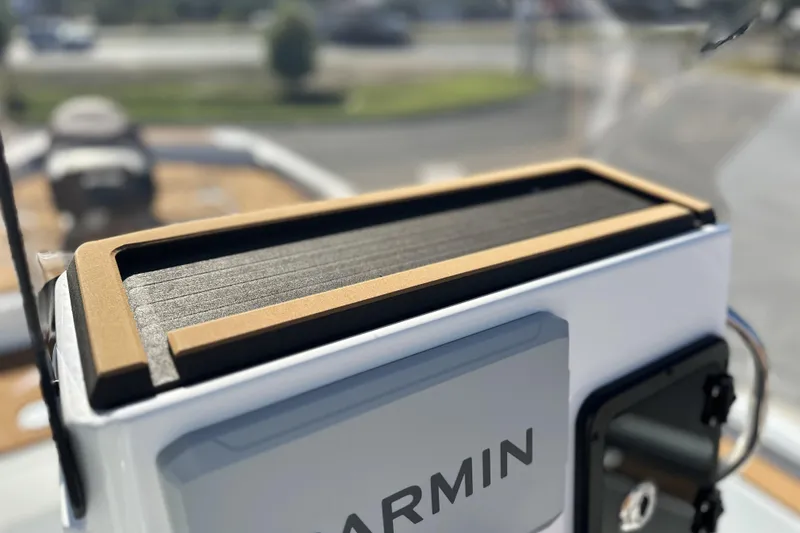 Slide: The Image of Close-up of Garmin device on Avid 207 Recon, 2026 model, with blurred background. - 12