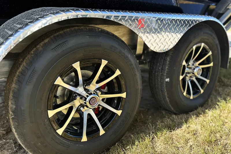 Slide: The Image of Close-up of Avid 207 Recon 2026 trailer wheels with stylish alloy rims. - 24