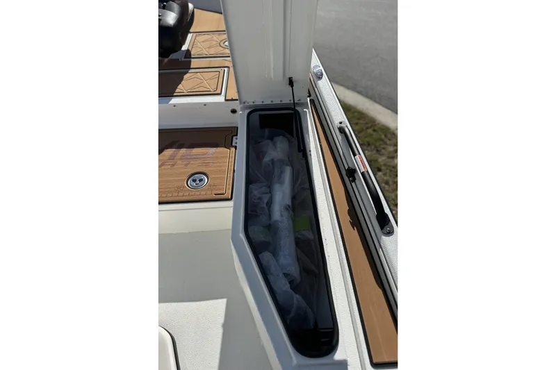 Slide: The Image of Storage compartment on Avid 207 Recon boat, showcasing sleek design and functionality, 2026 model. - 25