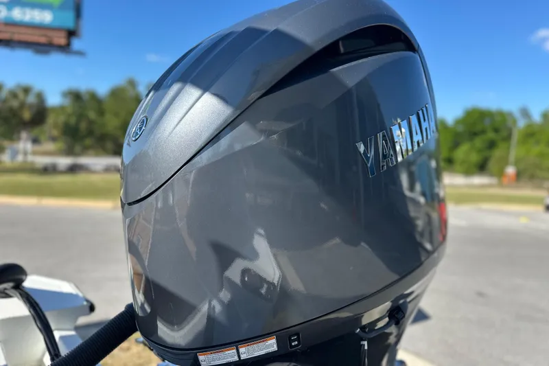 Slide: The Image of Yamaha outboard motor on Avid 207 Recon, 2026 model, in outdoor setting. - 3