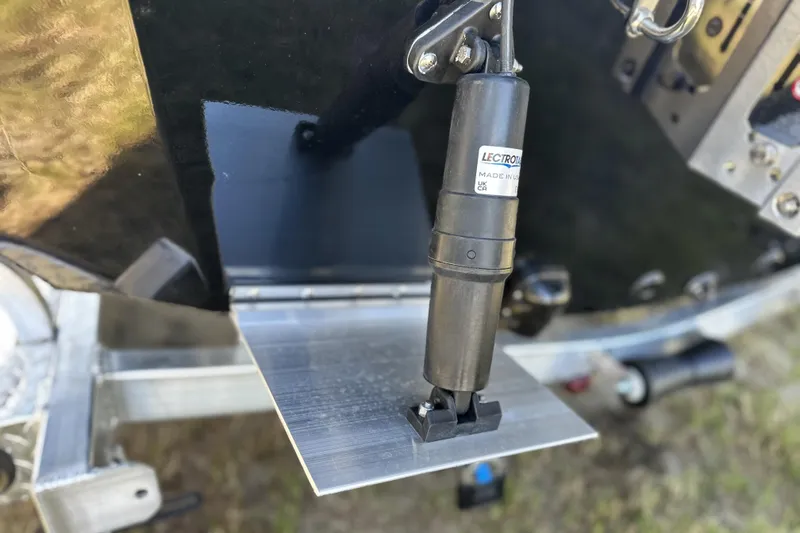 Slide: The Image of Close-up of Avid 207 Recon 2026 mechanical component with "Lectrotab" label. - 9