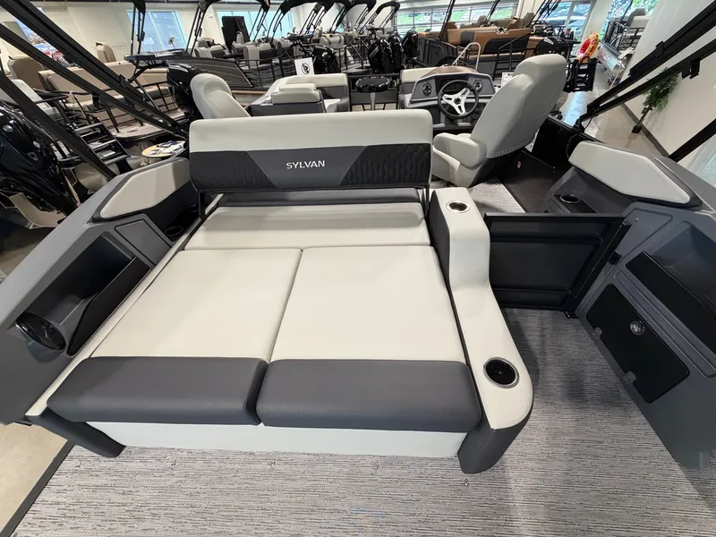Slide: The Image of The image shows the interior of a 2027 Sylvan R-20 Q DH with gray upholstery. - 20