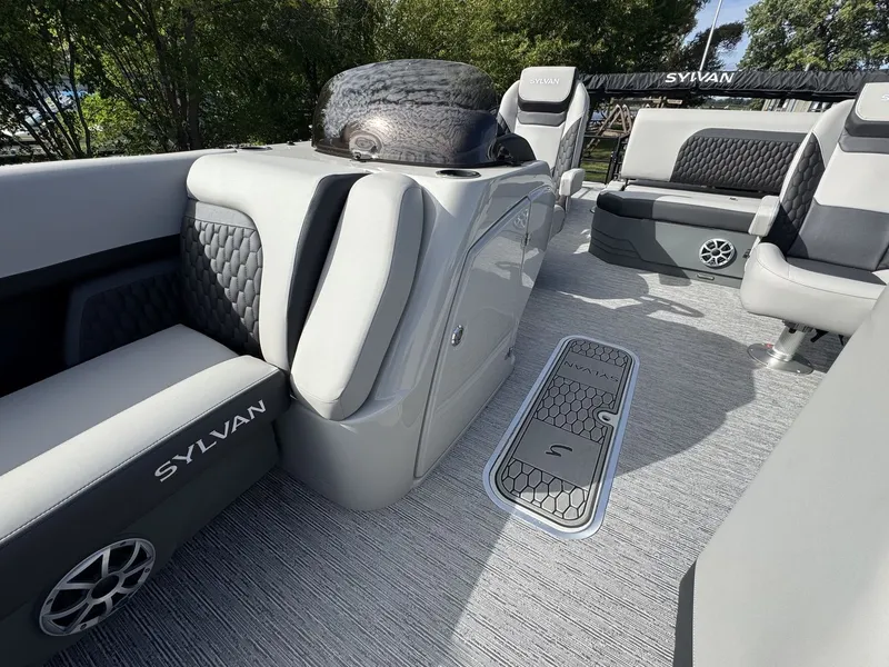 Slide: The Image of The image shows the interior of a 2026 Sylvan L3 DLZ boat with gray upholstery and modern details. - 21