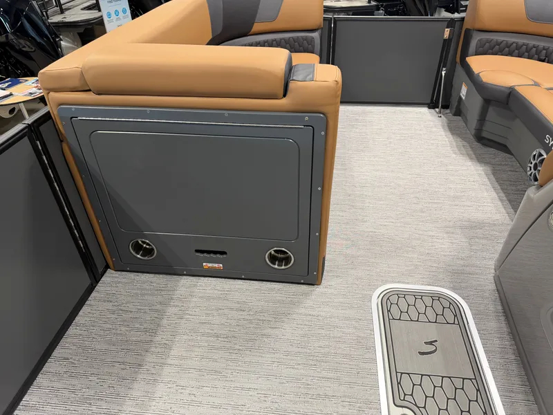 Slide: The Image of Interior of the 2026 Sylvan L3 DLZ with beige and gray upholstery. - 21