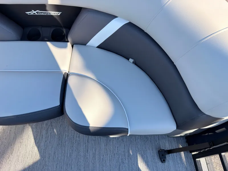 Slide: The Image of The seating area of a Sylvan MIRAGE X3 DLZ BAR with gray and black upholstery. - 13