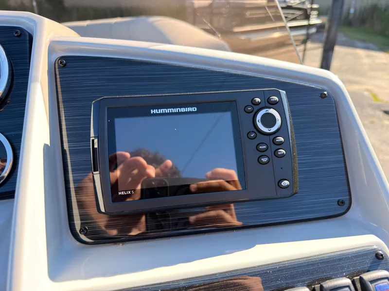 Slide: The Image of A modern navigation system is integrated into the dashboard of a 2026 Sylvan MIRAGE X3 DLZ BAR. - 39