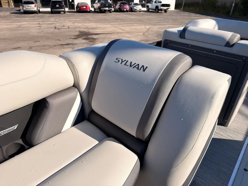 Slide: The Image of The Sylvan MIRAGE X3 DLZ BAR seats feature light leather with gray accents. - 48