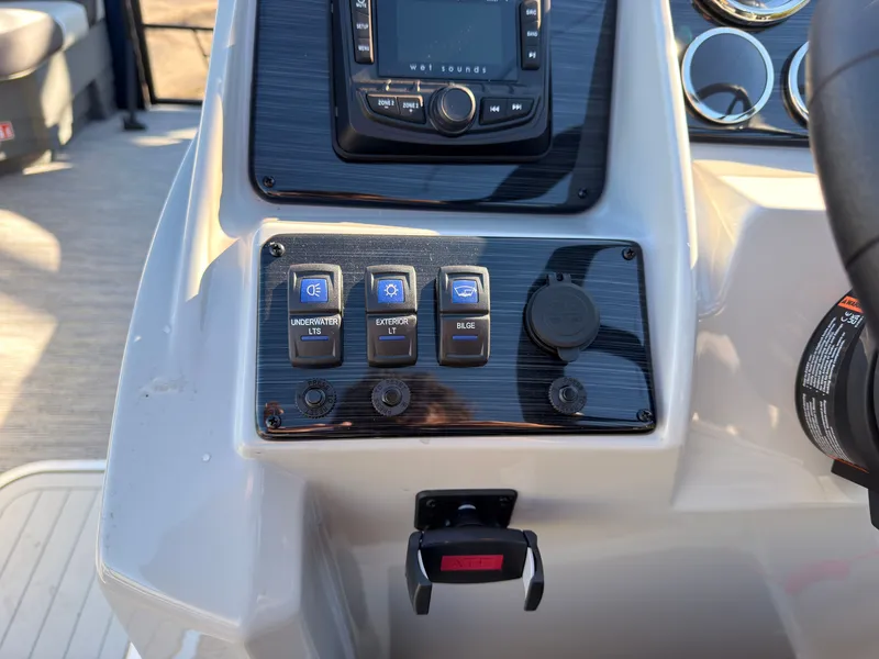 Slide: The Image of Close-up of a Sylvan MIRAGE X3 DLZ BAR console with switches and controls. - 36
