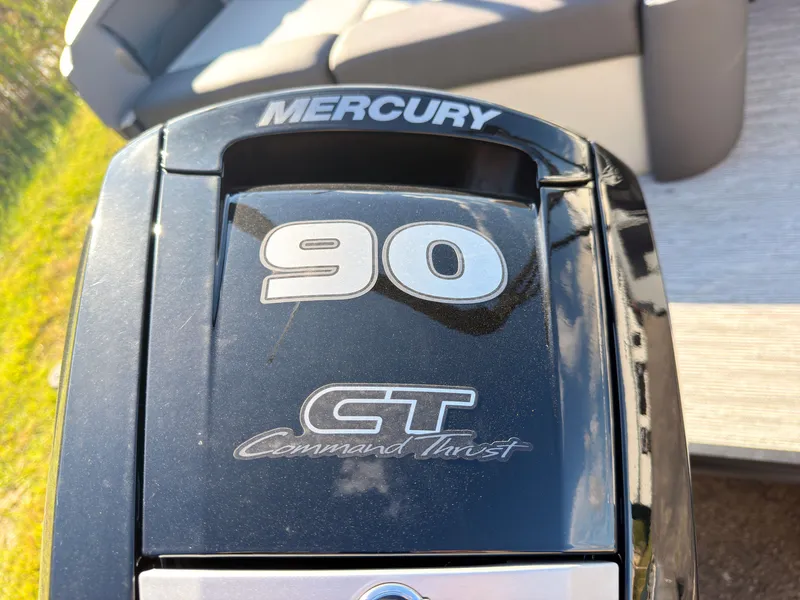 Slide: The Image of A Mercury 90 HP outboard motor with Command Thrust on a Sylvan boat. - 44