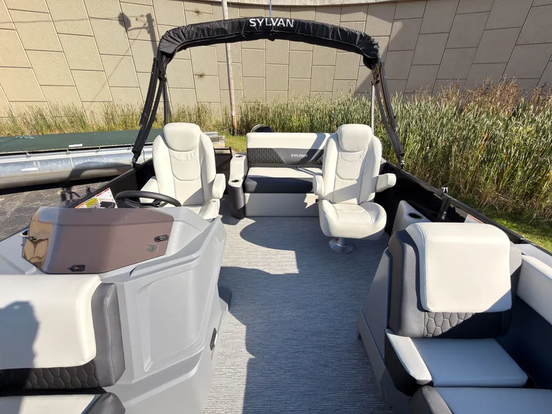Slide: The Image of The image shows a 2027 Sylvan R-20 Q DH boat with sleek seating and a modern design. - 21