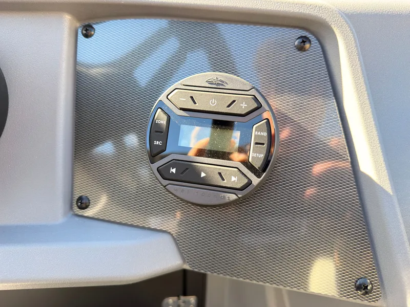 Slide: The Image of Close-up of a modern control system on a Sylvan boat, model R-20 Q DH, year 2027. - 32