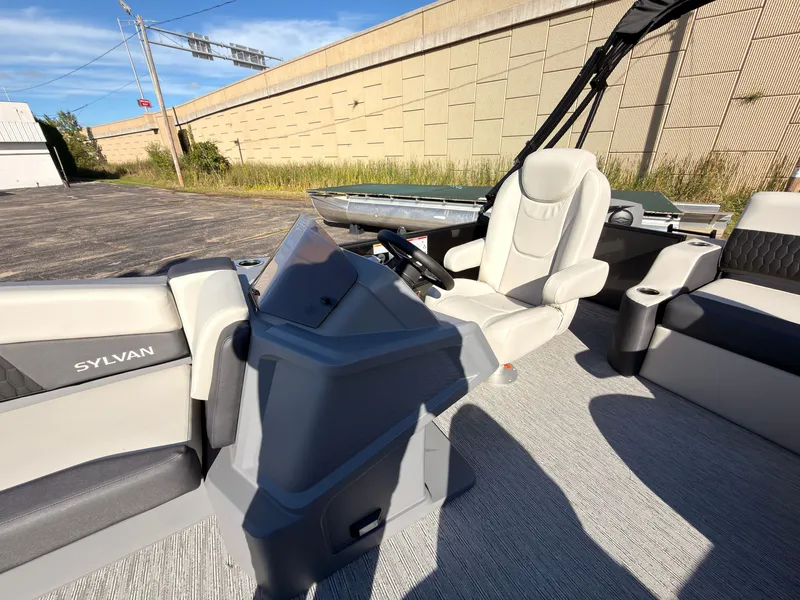 Slide: The Image of The image shows the cockpit of a 2027 Sylvan R-20 Q DH with a comfortable captain's chair. - 24