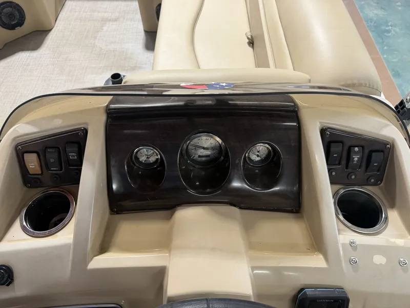 Slide: The Image of Dashboard of a 2016 Bennington 20SLX pontoon boat with gauges and switches. - 19