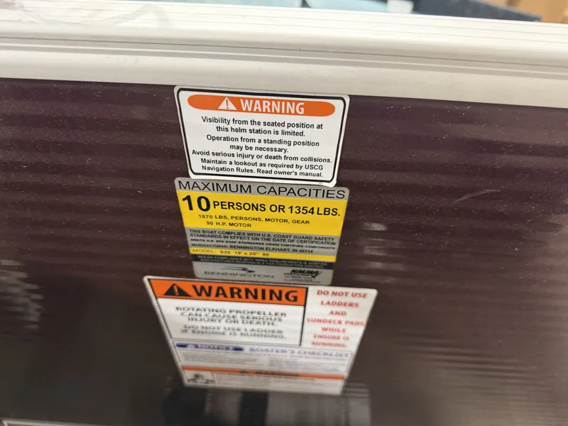 Slide: The Image of Warning labels on a 2016 Bennington 20SLX boat. - 21