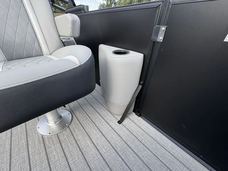 Slide: The Image of Close-up of a seat and cup holder on a boat. - 21